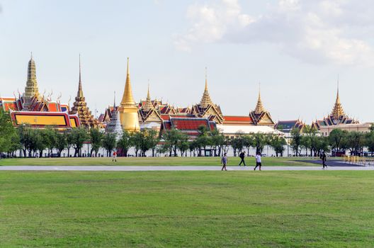 BANGKOK,THAILAND - JULY 3: Wat Phra Kaew, Grand Palace, Bangkok. View from the lawn or Sanam Luang, July 3, 2014 in Bangkok,Thailand
