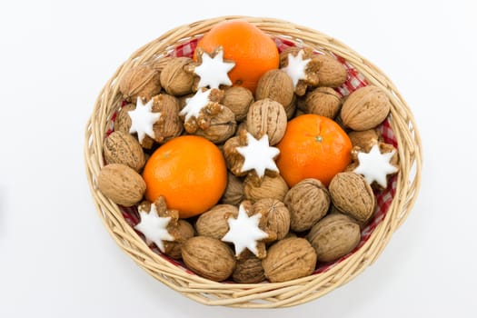 Small present basket with Walnuts, Tangerines and Cinnamon Stars