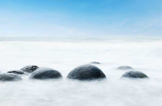 Moeraki Boulders on the Koekohe beach, Eastern coast of New Zealand. 