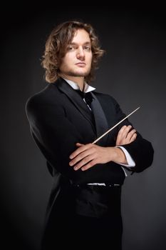 Portrait of a Young Conductor Holding a Baton.