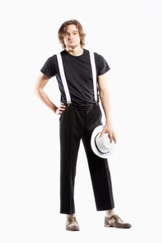 Young Man with Brown Hair Holding a White Hat - Isolated on White.