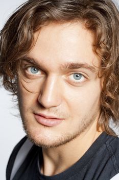 Closeup Portrait of a Young Man with Brown Hair.