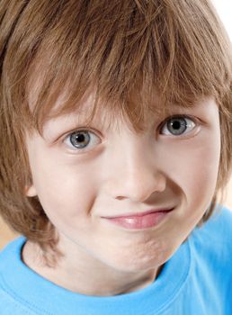 Portrait of a Boy with Blond Hair Looking - Isolated on White