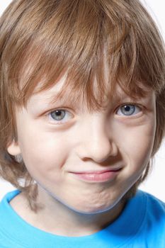 Portrait of a Boy with Blond Hair Looking - Isolated on White