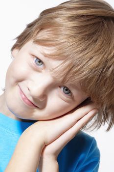 Portrait of a Boy with Blond Hair Looking - Isolated on White