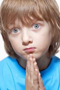 Portrait of a Boy with Blond Hair Looking - Isolated on White