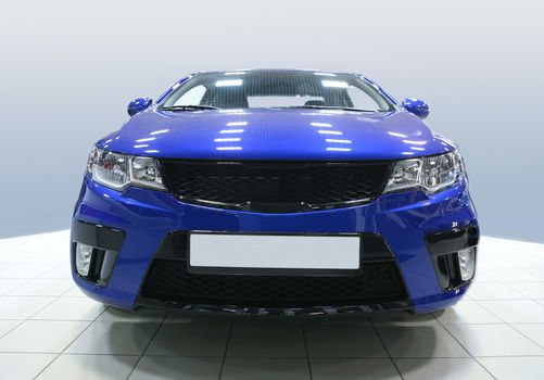 new blue car in motor show