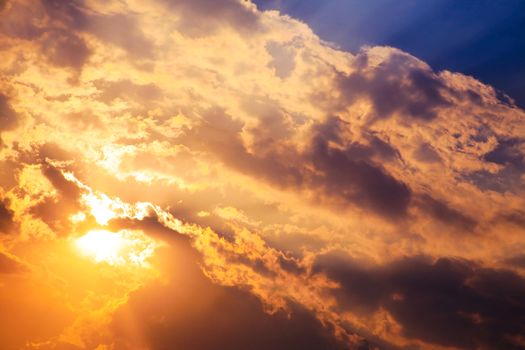 Beautiful bright sunset with cumulus clouds.