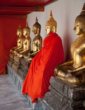 Golden Buddha statues in a Buddhist temple