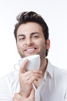 man in shirt holding cup of coffee smiling - isolated on white