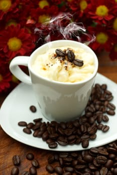 Espresso con panna coffee and Red chrysanthemum flower