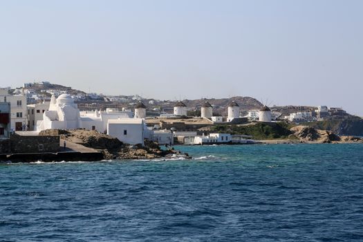 View from the sea of the famous Mykonos wind mills