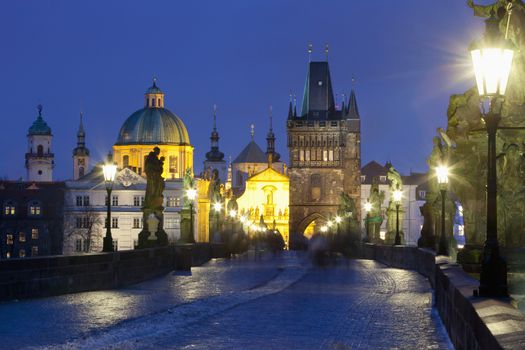 czech republic prague - charles bridge and spires of the old town at dusk