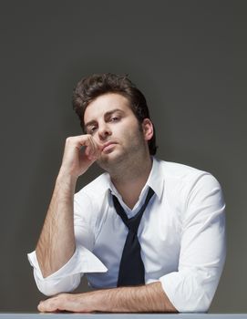 businessman in white shirt looking, thinking - isolated on gray