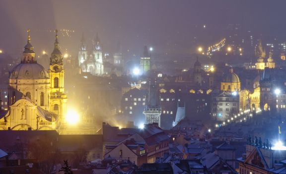 czech republic, prague - illuminated spires of the old town and Nicolaus church