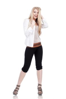 young woman with blond hair standing - isolated on white