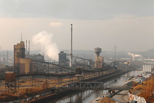 Old, dirty industrial district with smog