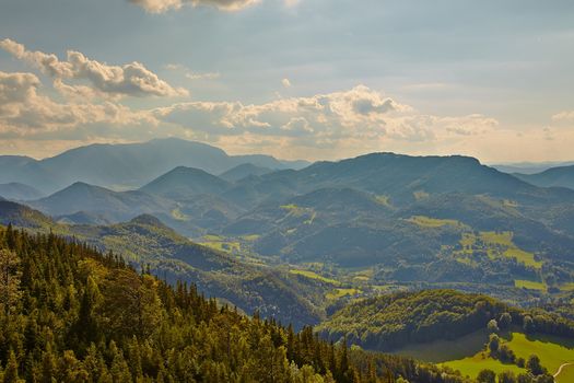 Mountain landscape in hazy weather, soft natural background.