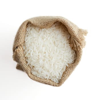 rice in burlap sack isolated on white