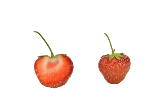 Close-up of two fresh strawberries on white background