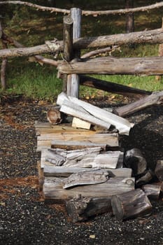 Pile of chopped firewood in a rural home setting