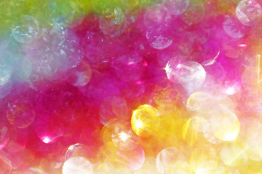 Bright multi-colored (yellow and pink) spots as abstract background                               