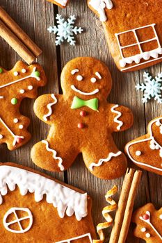 Christmas homemade gingerbread cookies on wooden table