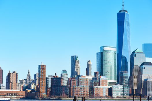 New York City Manhattan skyline with One World Trade Center Tower (AKA Freedom Tower) over Hudson River viewed from New Jersey