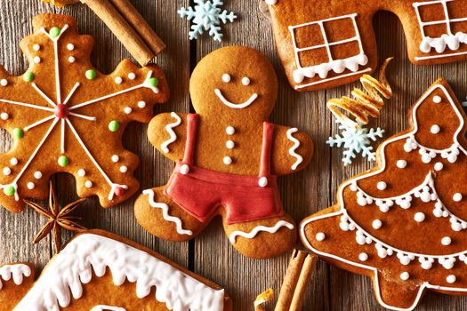 Christmas homemade gingerbread cookies on wooden table