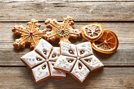 Christmas homemade gingerbread cookies on wooden table