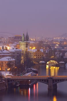 czech republic, prague - bridges over vltava river at dusk