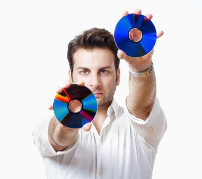 man in white shirt standing holding CD - isolated on white