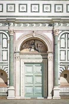 Closeup entrance of church Santa Maria Novella in Florence, Italy