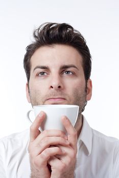 man in shirt holding cup of coffee looking up - isolated on white