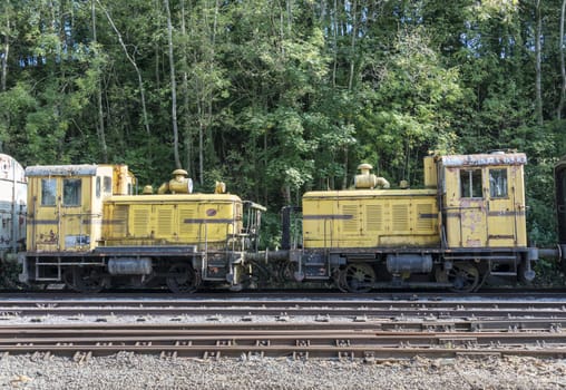 two old yellow locomitives