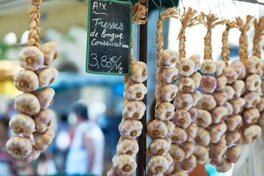 Violet garlic for sale at  farmers market in Aix en Provence, France