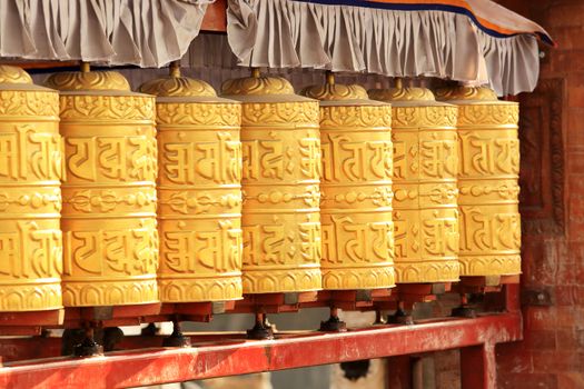 Buddhist prayer wheels. Swayambhunath Stupa, Kathmandu, Nepal