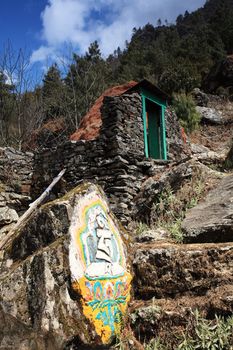 Carved stone tablets. Everest region, Nepal, Himalayas
