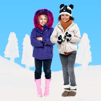 Two kids in winter wear against snow background