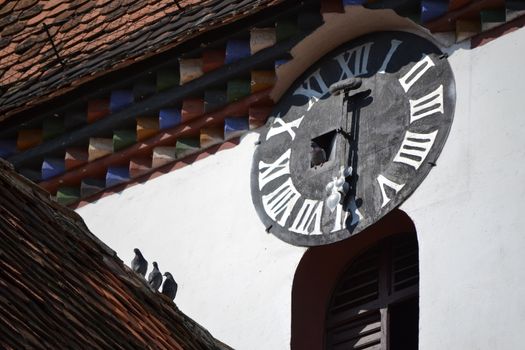 Old clock tower in a church from Saliste Romania