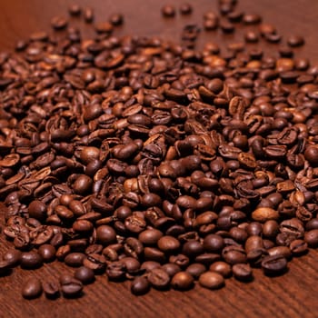 Closeup image of deep roasted coffee grains
