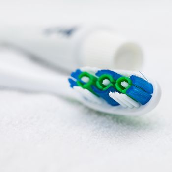 Closeup image of professional toothbrush and toothpaste in tube