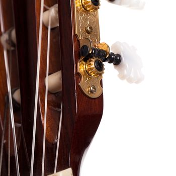 Closeup image of acoustic guitar fingerboard