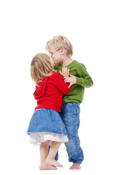 children - brother and sister kissing each other - isolated on white