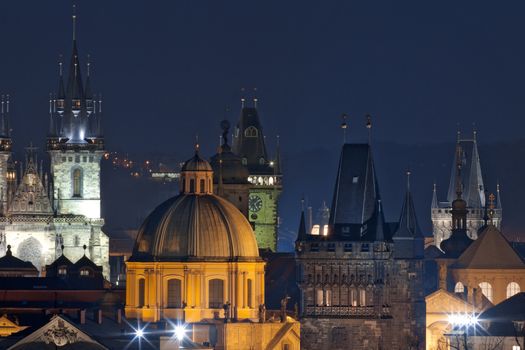 czech republic, prague - spires of the old town and tyn church at dusk