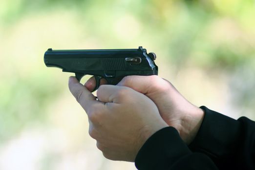 Shooting with the Makarov pistol with two hands