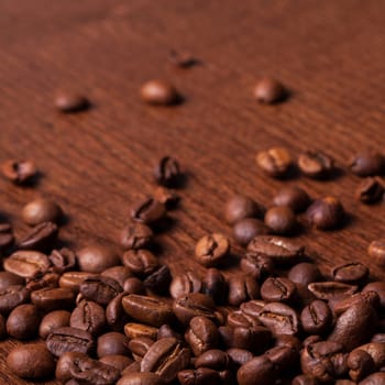 Closeup image of deep roasted coffee grains