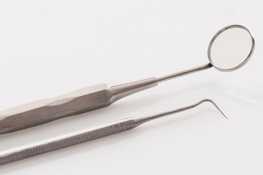 Many instruments that are use by a dentist