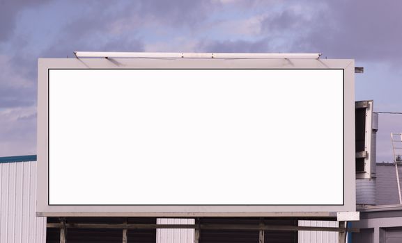 A downtown city billboard ready for your message to be dropped in