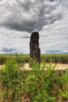 Menhir Stone Shepherd (also Stone Man, Petrified Man or Petrified minister) is a menhir standing alone in a field 1 km northwest of the village Klobuky, district Kladno. This is the highest menhir in the Czech Republic.  3.5 m tall columnar rock uncut dark iron Cretaceous sandstone. This is one of the few stones in the country, which we can with high probability be considered a real prehistoric menhir.